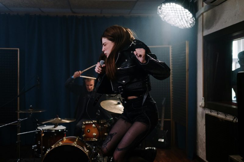 A Band rocking in a soundproof recording studio built to be soundproofing room for drums
